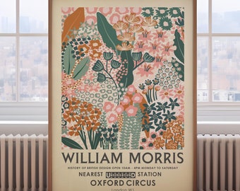 May include: A framed art print featuring a floral design in shades of pink, green, orange, and cream. The print includes the text "WILLIAM MORRIS" and details about the "OXFORD CIRCUS" station in London.