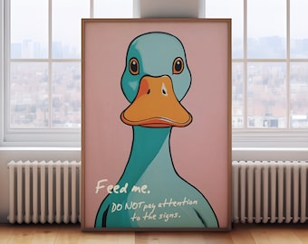 May include: A teal blue duck with an orange beak and a pink background. The duck is looking directly at the viewer. The text "Feed me. DO NOT pay attention to the signs." is written below the duck.
