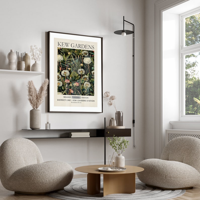 May include: A framed poster with a vintage design featuring a botanical illustration of dandelions. The poster has the text "Kew Gardens" and "Nearest Underground Station District Line - Kew Gardens Station" printed on it.