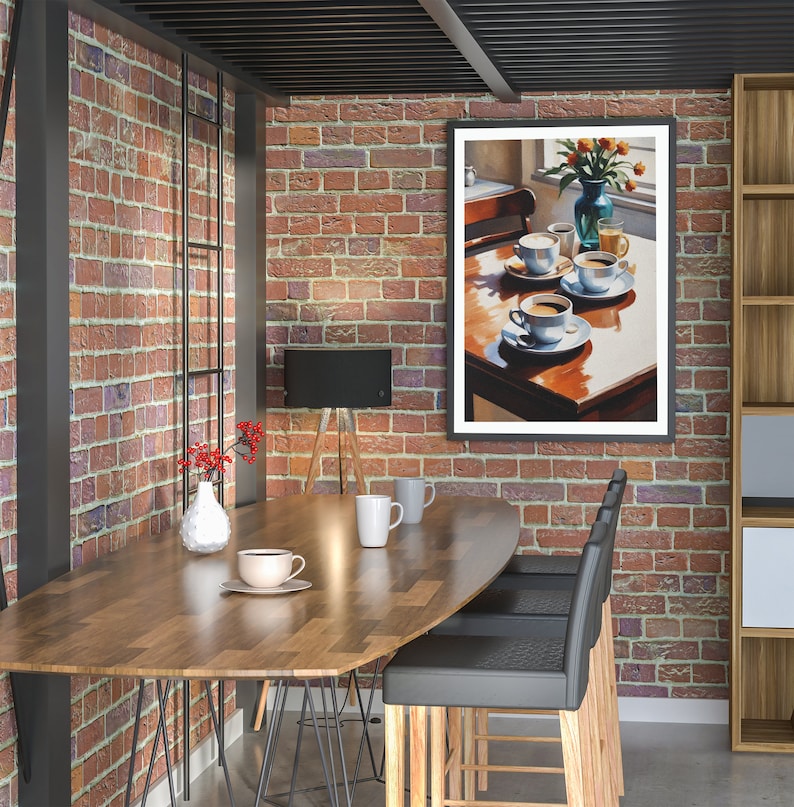 May include: A wooden table with a brown oval tabletop and black metal legs. There are four black chairs with wooden legs and a painting of a table setting with cups of coffee and a vase of flowers on the wall.