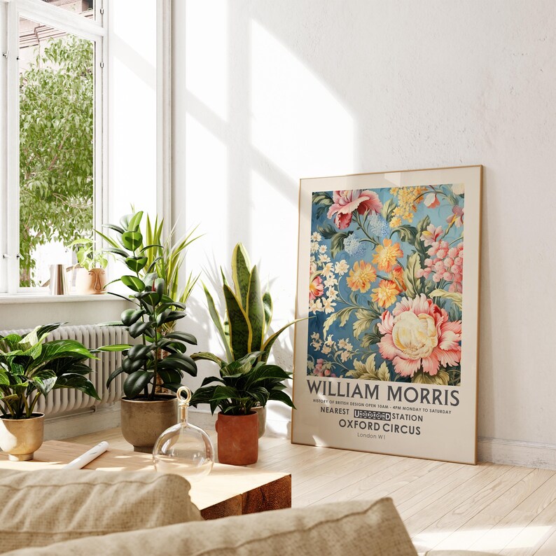 May include: A framed poster with a floral design in shades of pink, yellow, and blue. The poster features the text "William Morris" and "Nearest Underground Station Oxford Circus London W1."