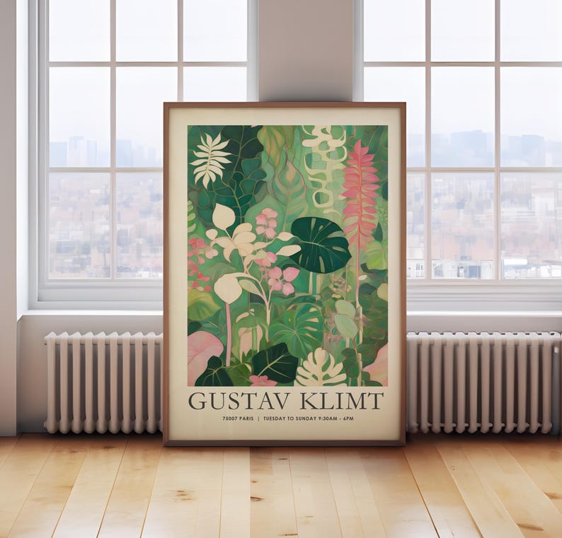 May include: A framed art print featuring a botanical illustration in shades of green, pink, and white. The artwork, attributed to Gustav Klimt, showcases various plant species. The print includes text at the bottom with the artist's name and location.