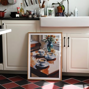 May include: A framed print of a still life painting featuring four cups of coffee on a wooden table. The cups are white with blue accents and are arranged in a row. There are flowers in a blue vase in the background.