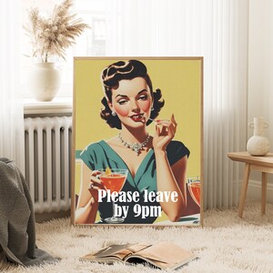 May include: A vintage-style poster featuring a woman with red lipstick and a cocktail dress, holding a glass of a red drink. The poster has the text "Please leave by 9pm" in white letters.
