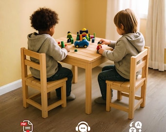 May include: A light-colored wooden square table and two matching chairs. On the table are various small, colorful plastic building blocks, a blue toy car, and two small toy figures. The furniture features a simple, slatted design.