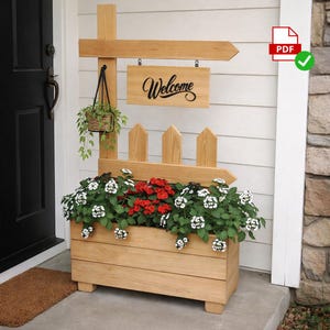 May include: A wooden welcome sign with a planter box filled with red and white flowers. The sign has a hanging basket with greenery and a sign that says "Welcome". The planter box has a picket fence design.