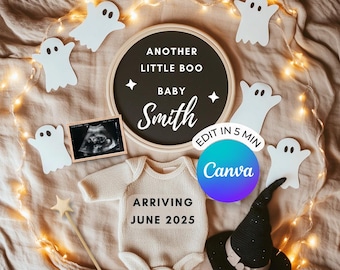 May include: A black chalkboard sign with the text "Another Little Boo Baby Smith" and a white ghost decoration. A white onesie with the text "Arriving June 2025" is on a tan fabric background with white ghost decorations and a string of lights. A black witch hat and a wooden wand are also on the fabric.