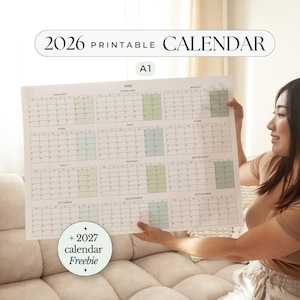 Könnte beinhalten: Ein großer, druckbarer Kalender 2026 mit minimalistischem Design. Der Kalender ist weiß mit grünen und blauen Akzenten, und der Text "2026 Printable Calendar" steht oben. Der Kalender enthält einen kostenlosen Kalender 2027.