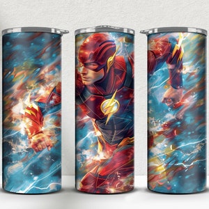 May include: Three stainless steel tumblers with a colorful abstract design featuring the Flash superhero. The design includes a red and yellow superhero costume with lightning bolts and a blue and yellow background.