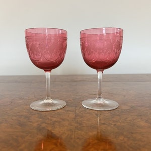 Pair of antique Victorian cranberry wine glasses