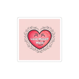 May include: A square sticker with a red heart, smiling face, and the words "Love Myself More" in white. The heart is framed by a leafy border, on a light pink background. A cute and positive design.