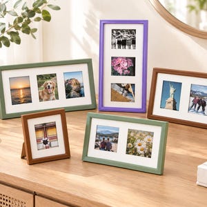 May include: A collection of five rectangular picture frames in various colours including sage green, purple, and brown. Each frame features a white mat board with multiple openings displaying assorted photographs of landscapes, people, and flowers.