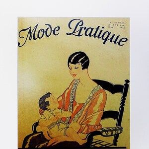 May include: Vintage poster titled "Mode Pratique" featuring an illustration of a woman in a peach-colored dress holding a baby. The poster has text in French and is set against a beige background. The poster is a special edition titled "Nos Bébés".