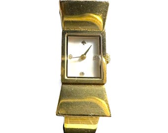 Kate Spade Watch & Bangle Set: Gold Bow Watch, Black Enamel Bracelet