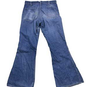 Vintage 70s CIO button front sea farer denim bellbottoms. Made in the USA. Size tag is missing, measures as a 30 x 30.