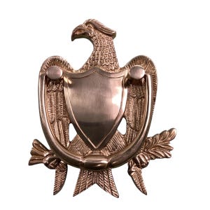 Vintage brass bald eagle door knocker. Orange is wide, 6 inches high. High-quality. Smoke and pet free home. 