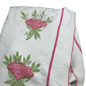 Vintage quilted cotton blanket. Hand crafted in the USA. 80 x 86 fair condition. White and red. Bedroom