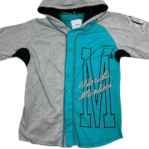 Vintage Florida Marlins MLB Starter 80s/90s MLB button front fan jersey. Made in Korea. Tagged as an adult medium.