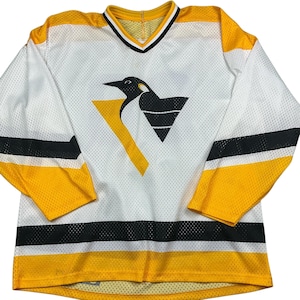 Vintage Pittsburgh Penguins 80/90s #68 CCM hockey jersey. Made in the USA.  100% polyester.. tagged as a large.