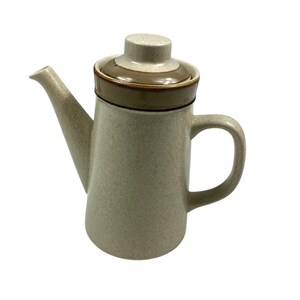 Vintage 70s Sahara tan Sears Pitcher. Made in Japan. Hand decorated. Dishwasher safe. 9 1/2 inches high, 5 inches wide bottom