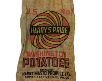 Vintage Harry's Pride Washington jute tas. jaren 50 Gemaakt in de VS. 16 inch breed, 29 inch lang. Verkleuring overal. Hoge kwaliteit.