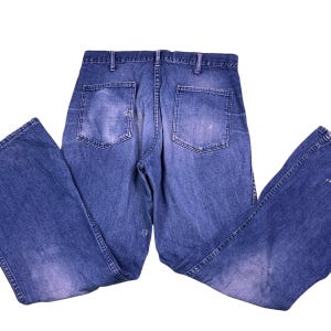 Vintage 70s CIO Sea Farer button front denim bellbottoms. Union Made in the USA. Size tag is missing, measures as a 31 x 30.