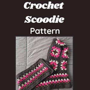 May include: A dark gray crochet scoodie and matching rectangle, featuring a granny square design with pink, white, and brown accents. The text on the image reads "SquareOne Crochet Scoodie Pattern."