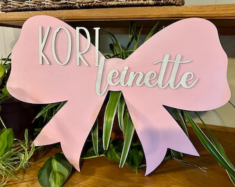 Letrero con nombre y lazo rosa, decoración de madera personalizada para habitación infantil