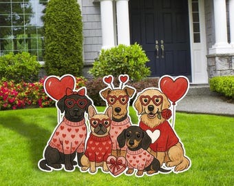 May include: A group of five dog cutouts, each wearing heart-shaped glasses and sweaters with heart patterns. One dog holds a red heart balloon, and another holds a red rose. A heart-shaped gift box is also present.
