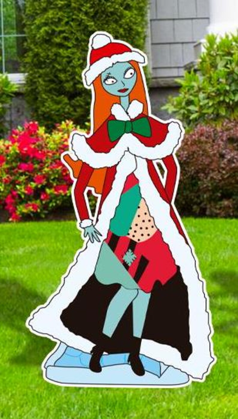 Może przedstawiać: Wycięty wz&oacute;r postaci w świątecznym stylu, ubrany w czerwoną i białą sukienkę z zieloną kokardką, biały płaszcz obszyty futrem i czerwony kapelusz Świętego Mikołaja. Postać ma niebieską sk&oacute;rę, długie pomarańczowe włosy i stoi na niebiesko-białej powierzchni przypominającej l&oacute;d.