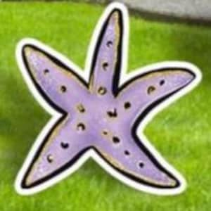 May include: A purple starfish sticker with a black outline and gold accents. The sticker has a white border and is set against a green background, suggesting an outdoor or beach theme. The starfish has five points and small, dark spots.