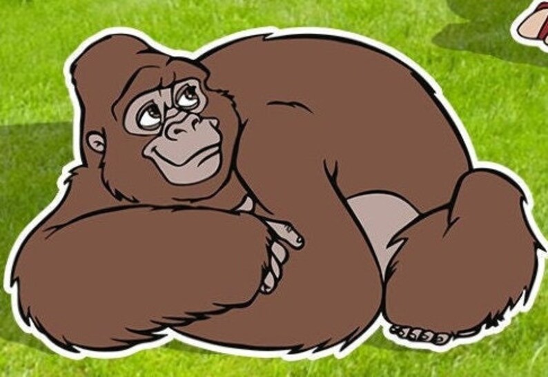 May include: A brown cartoon gorilla sitting on its haunches with its arms crossed in front of it. The gorilla is looking to the right of the image.