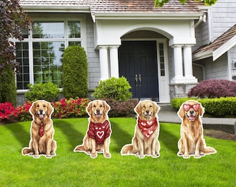 May include: Four golden retriever yard decorations are displayed on a green lawn in front of a house. Each dog is wearing a different accessory, including a tie, sweater, and heart-shaped sunglasses. The decorations are for Valentine's Day.
