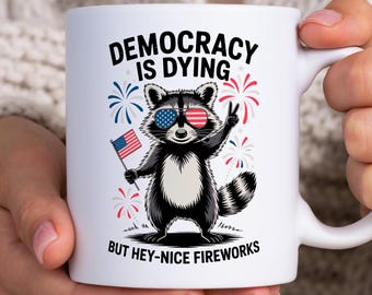 Democracy Is Dying Raccoon Mug, Funny Political Satire Gift, Patriotic Raccoon Coffee Mug, American Flag Sunglasses, Humorous Animal Mug
