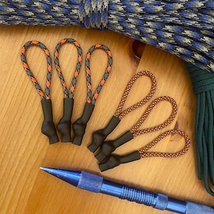 Paracord Zipper Pulls - 3.5 Inches - Assorted Color Patterns - Black Tubing - Pack of 3 or 6
