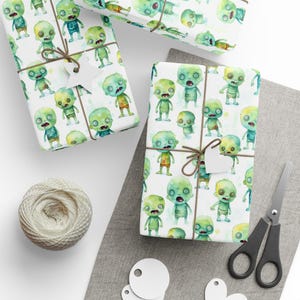 Papel de regalo de zombi: adorable papel de regalo de Halloween con acuarela y personajes de zombis verdes. Empaquetado de regalo único de Agnes Pembroke.