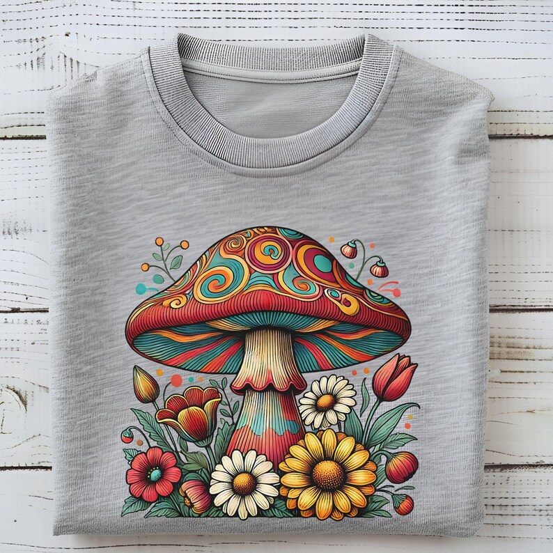 May include: A gray sweatshirt with a colorful psychedelic mushroom graphic surrounded by flowers. The mushroom has red, blue, green, and yellow swirls. The flowers are red, yellow, and white.