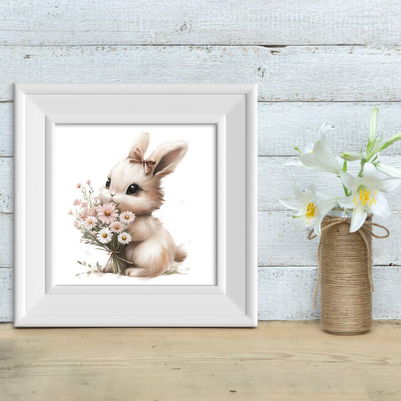 May include: A white rabbit with a pink bow holds a bouquet of white and pink flowers. The rabbit is sitting on a white background.