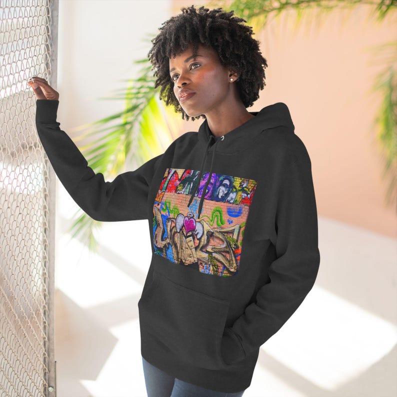 Male Wearing White Champion Hooded Sweatshirt Graffiti Love Graphic Hoodie - Vibrant Streetwear Fashion Graffiti Love Graphic - Hooded Sweatshirt Fashion Graffiti Love Graphic Hoodie Urban Street Style Graffiti Love Graphic Hoodie - Urban Streetwear