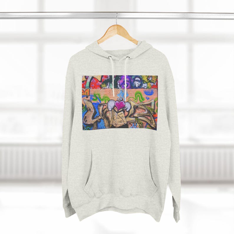 Male Wearing Black Champion Hooded Sweatshirt Graffiti Love Graphic Hoodie - Vibrant Streetwear Fashion Graffiti Love Graphic - Hooded Sweatshirt Fashion Graffiti Love Graphic Hoodie Urban Street Style Graffiti Love Graphic Hoodie