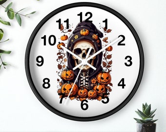 May include: A black and white wall clock featuring a skeleton wearing a black hooded robe and surrounded by pumpkins. The clock face has black numbers and hands.