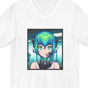 May include: White V-neck t-shirt featuring a square graphic of an anime-style character with blue and green hair, blue eyes, and a futuristic headset. The character is set against a blurred, teal background. The shirt is made of a soft, lightweight material.