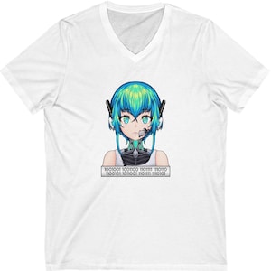 May include: White V-neck t-shirt featuring a graphic of an anime-style character with blue and green hair, wearing a headset and cybernetic enhancements. The graphic includes binary code at the bottom. A casual, comfortable tee.