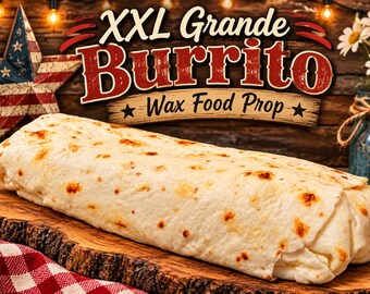 May include: A wax food prop shaped like a large burrito with a light-colored tortilla exterior featuring brown toasted spots. The text XXL Grande Burrito Wax Food Prop is displayed above the item in a decorative font style.