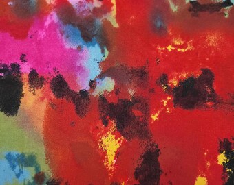 May include: Abstract fabric with a colorful tie-dye pattern in shades of red, pink, blue, green, yellow, and black. The fabric has a textured surface.