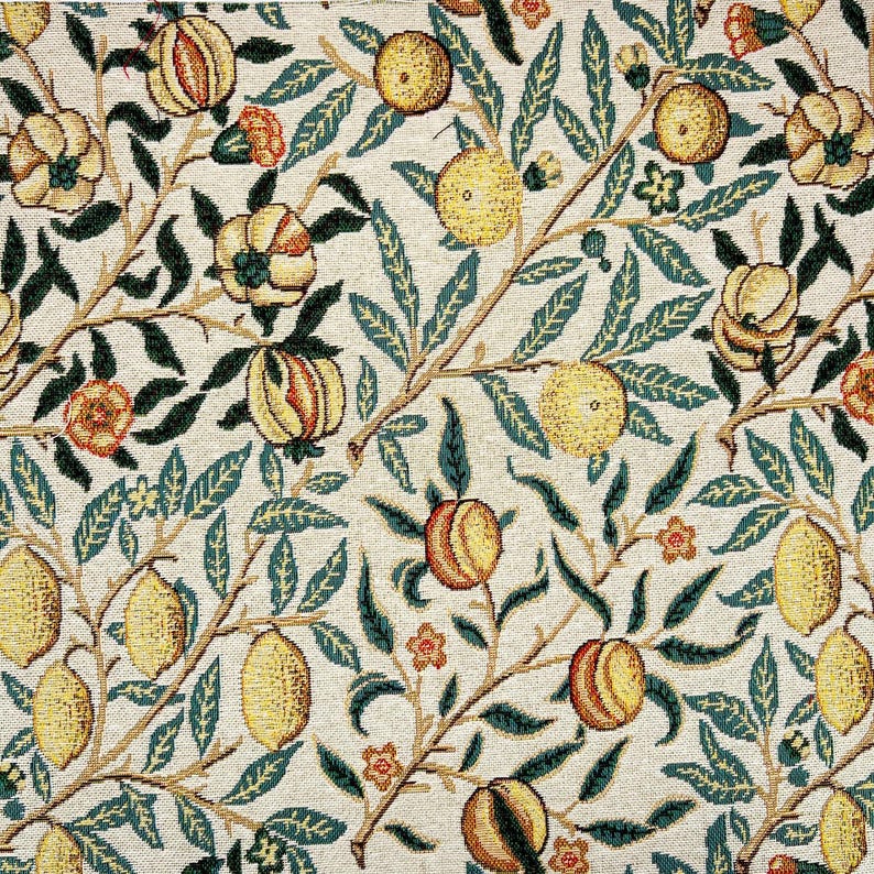 May include: A vintage tapestry featuring a repeating pattern of stylized lemons, pomegranates, and leaves in shades of yellow, green, and orange on a cream background.