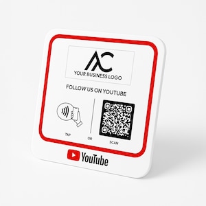 May include: White square sign with a red border. The sign has a black logo with the letters "AC" and the text "YOUR BUSINESS LOGO". Below the logo is the text "FOLLOW US ON YOUTUBE". The sign also has a black and white illustration of a phone with a contactless payment symbol and the word "TAP", the word "OR", a black and white QR code and the word "SCAN". The bottom of the sign has a red YouTube logo and the word "YouTube".