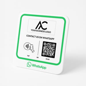 May include: A white square sign with a green border. The sign features a logo with the letters "AC" and the text "YOUR BUSINESS LOGO". The sign also includes the text "CONTACT US ON WHATSAPP" and a QR code. Below the QR code is the text "TAP OR SCAN". The sign also has a green WhatsApp logo.
