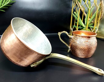 small quality 100% copper saucepan with copper mug cup, both carefully handcrafted, casserole resistant to everyday use.