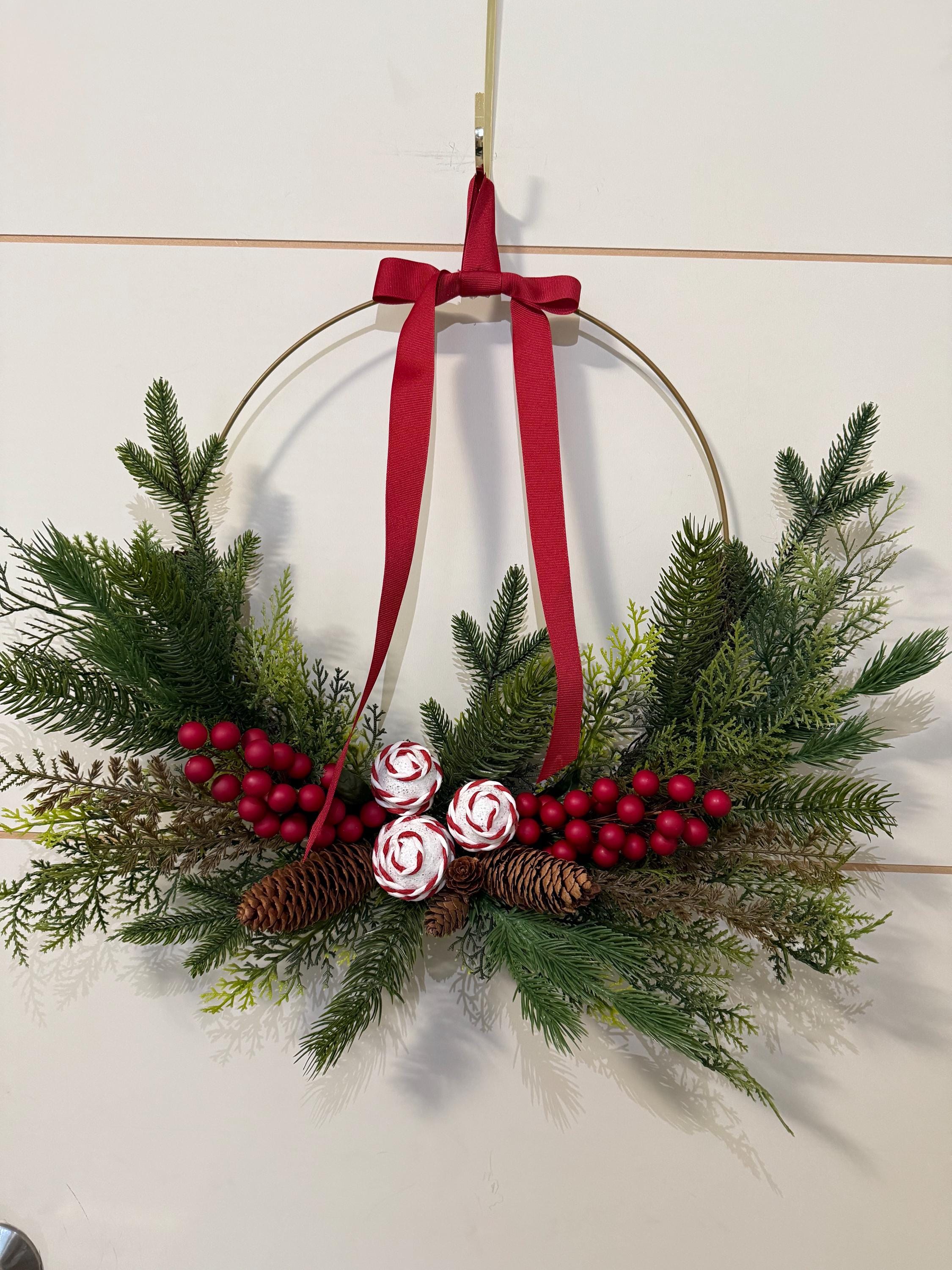 34 Space-Saving Christmas Decor Ideas for Apartments 11 Christmas Hoop Wreath with Ribbon Pinecones & Cedar Berries